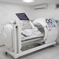 Hyperbaric Chamber Designed for Therapeutic Recovery, Transparent Cylindrical Shell, Integrated Control Panel